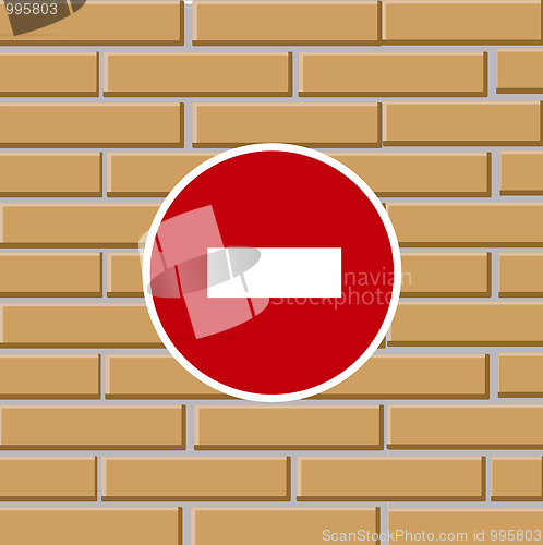 Image of Prohibiting traffic sign on brick wall