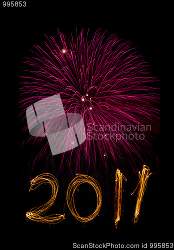 Image of New Year 2011 sparklers and magenta fireworks