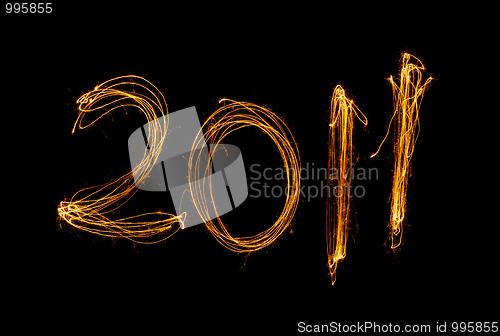 Image of New Year 2011 sparklers isolated on black