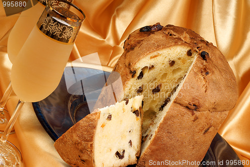 Image of Italian Christmas composition with panettone and spumante
