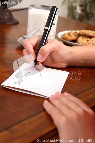 Image of Boy or girl writing a letter to Santa