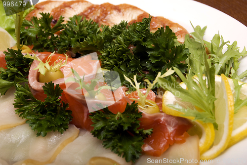 Image of Appetizer made of meat and fish   