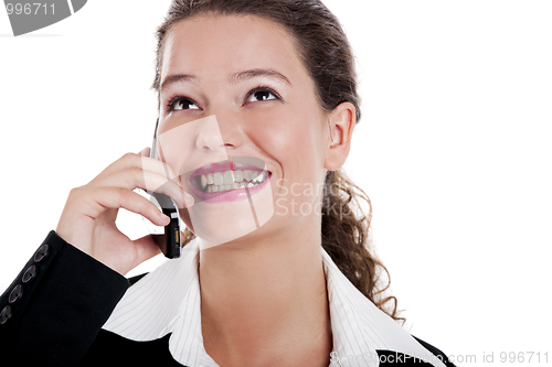 Image of Businesswoman talking on phone