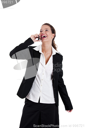 Image of Businesswoman talking on phone