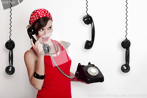 Image of Girl with a vintage phone
