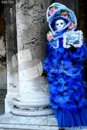 Image of Masked lady with a framework of Monet