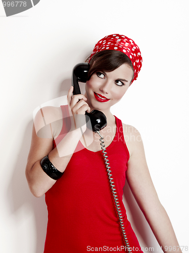 Image of Girl with a vintage phone
