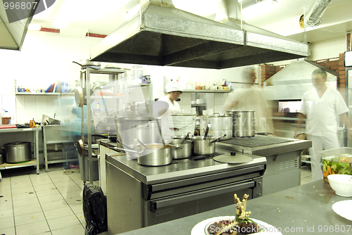 Image of Kitchen with staff    