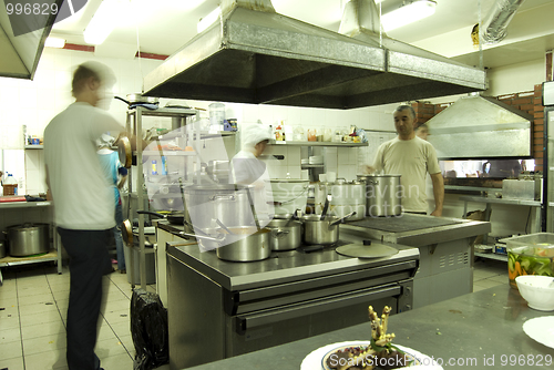 Image of Kitchen with staff    