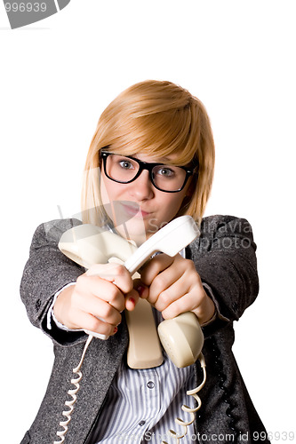 Image of businesswoman with three phones 