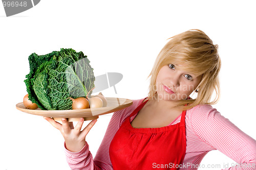 Image of woman with fresh savoy cabbage and onions