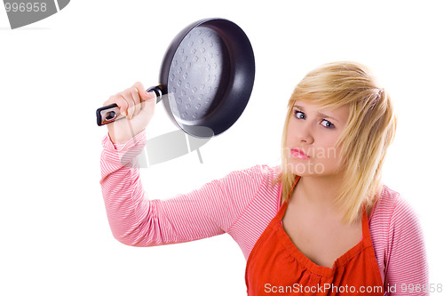 Image of pretty housewife with pan