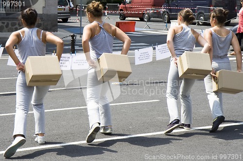 Image of Dancers with cartons