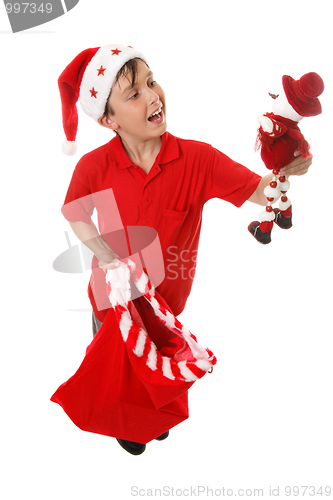 Image of Boy with toy Christmas sack