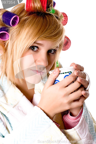 Image of housewife with curlers and cup