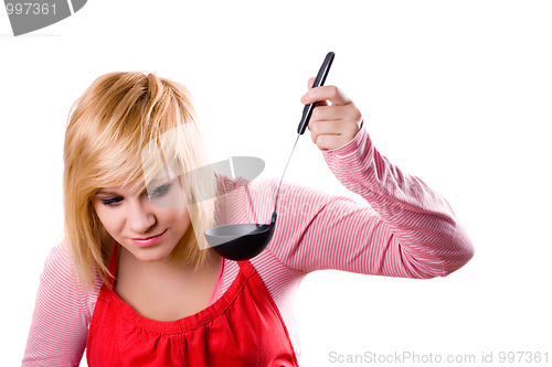 Image of housewife with soup ladle