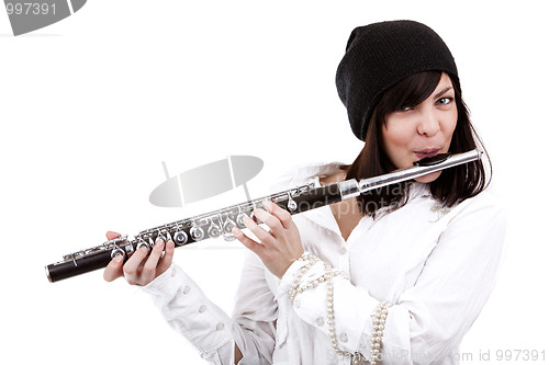 Image of Girl playing on flute