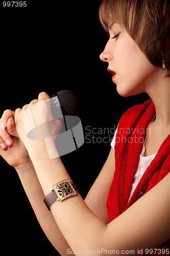 Image of Young singer with microphone