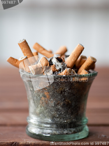 Image of ashtray full with butts