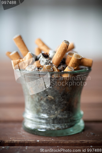 Image of ashtray full with butts