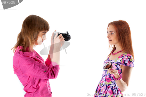 Image of Two girls are taken pictures
