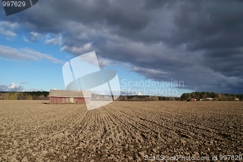 Image of Barn, Sky and the Ploughed Field Landscape