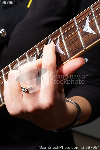 Image of Woman with guitar