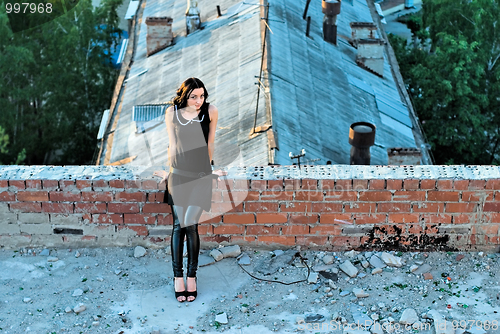 Image of Girl on roof