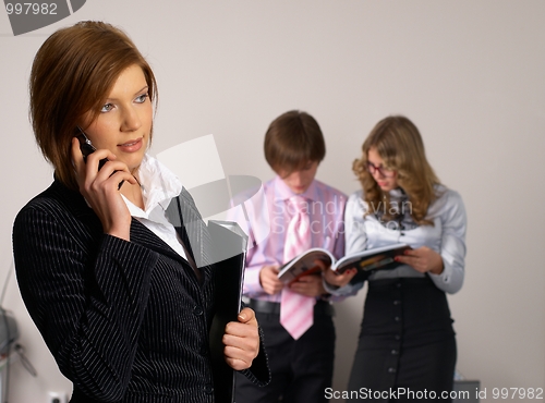 Image of Businesswoman with her team