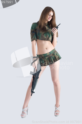 Image of Sexy girl with gun