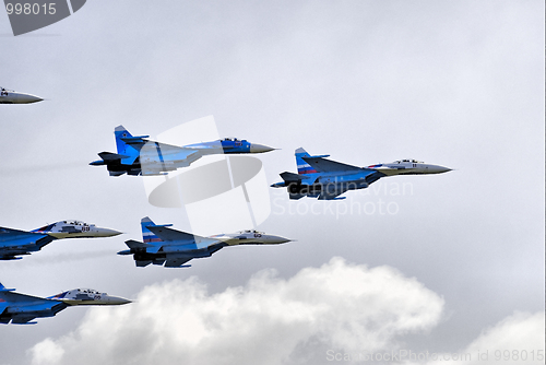 Image of SU-27 in clouds