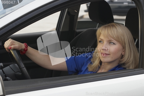 Image of Smiling woman on drive