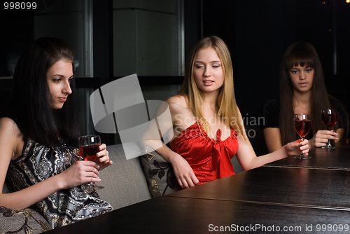 Image of young women with wine glass