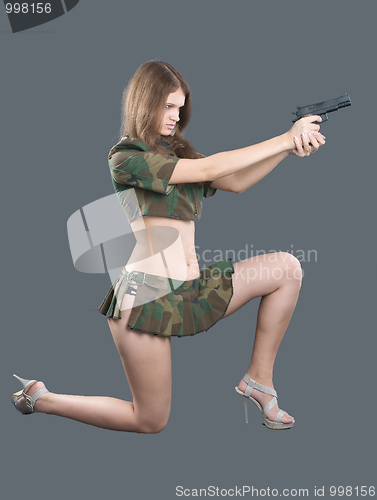 Image of Sexy girl with gun
