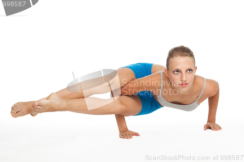 Image of Beautiful young woman in yoga pose