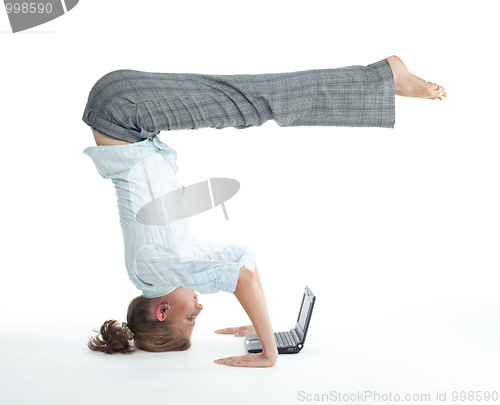 Image of Woman browsing  in unusual pose