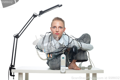 Image of Constrained woman in office