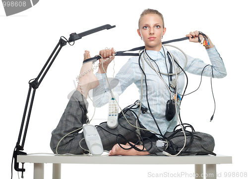 Image of Flexible business woman dealing with disorder