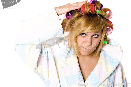 Image of funny housewife with curlers