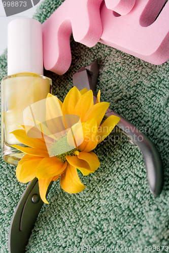Image of pedicure beauty set and flower