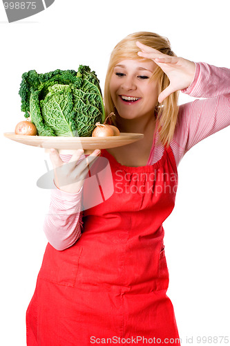 Image of woman with fresh savoy cabbage and onions