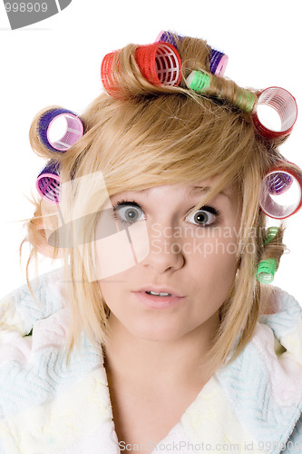 Image of  funny housewife with curlers