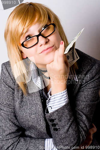 Image of businesswoman with money