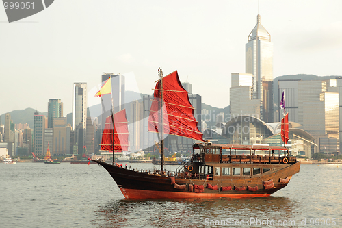 Image of sailboat sailing in the Hong Kong harbor