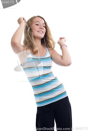 Image of teenager with mp3 player dancing