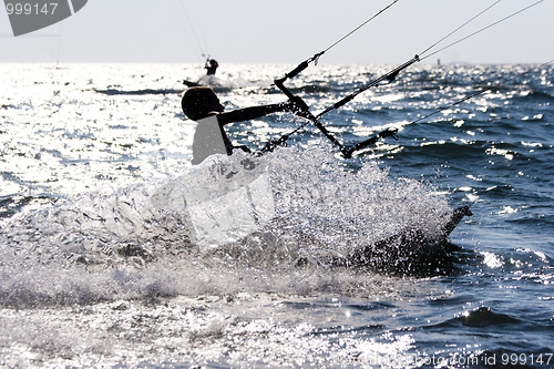 Image of kitesurfer  silhouette