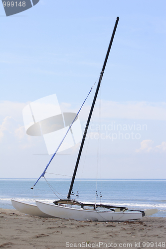 Image of catamaran on a beach