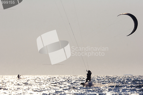 Image of kitesurfer  silhouette