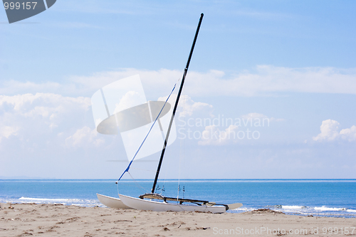 Image of catamaran on a beach