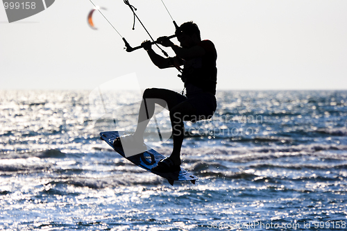 Image of kitesurfer  silhouette